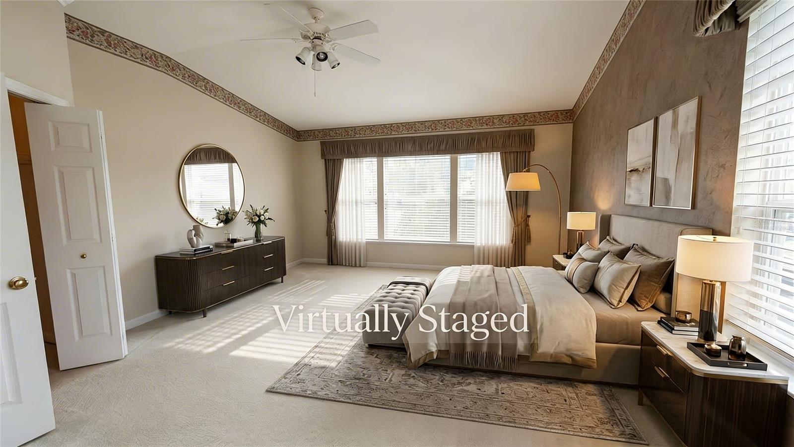 Primary bedroom with walk-in closet - Virtually Staged