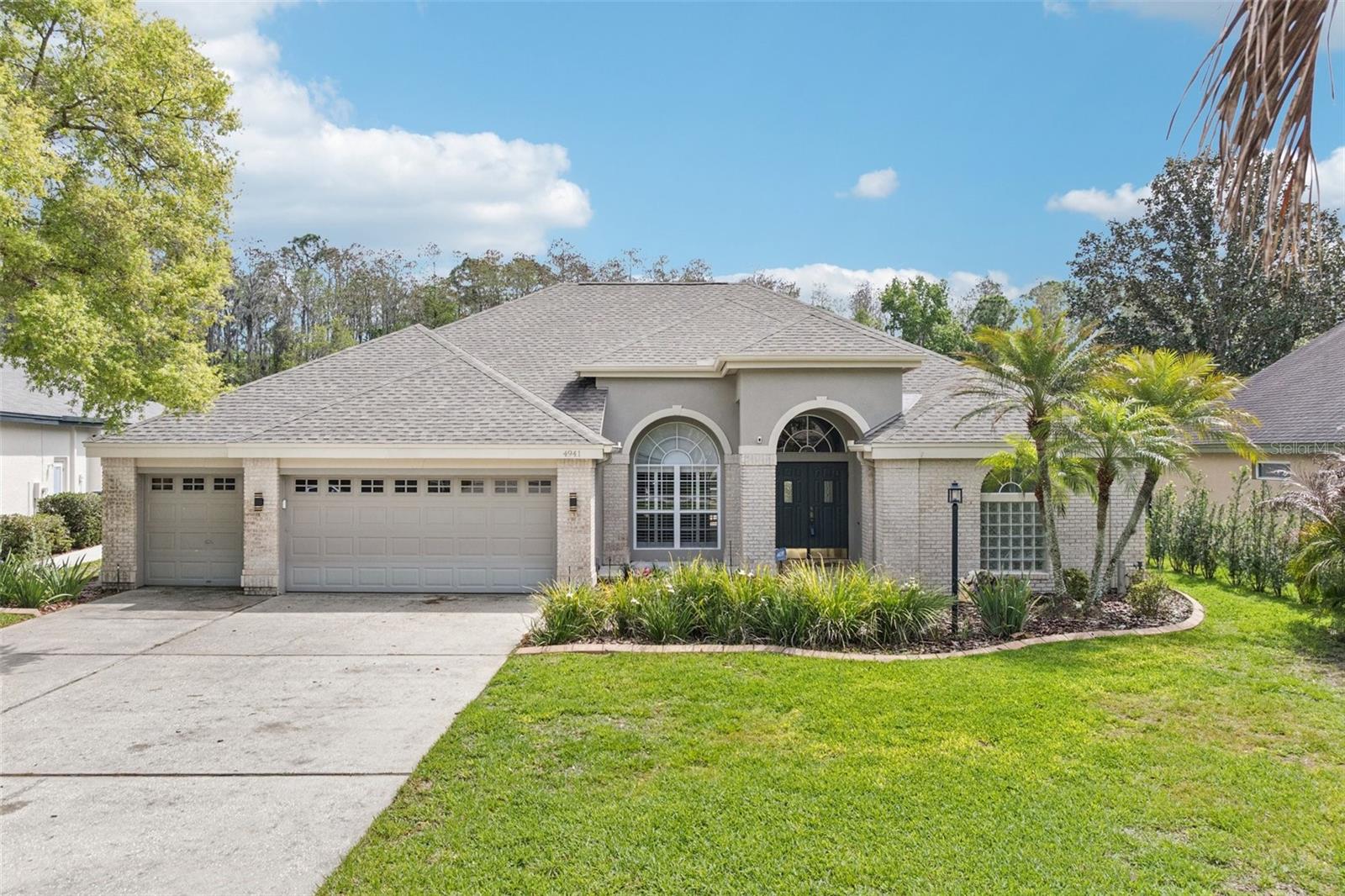 Welcome to 4941 Kylemore Ct in the desirable Lansbrook neighborhood of Fallbrook in Palm Harbor Florida