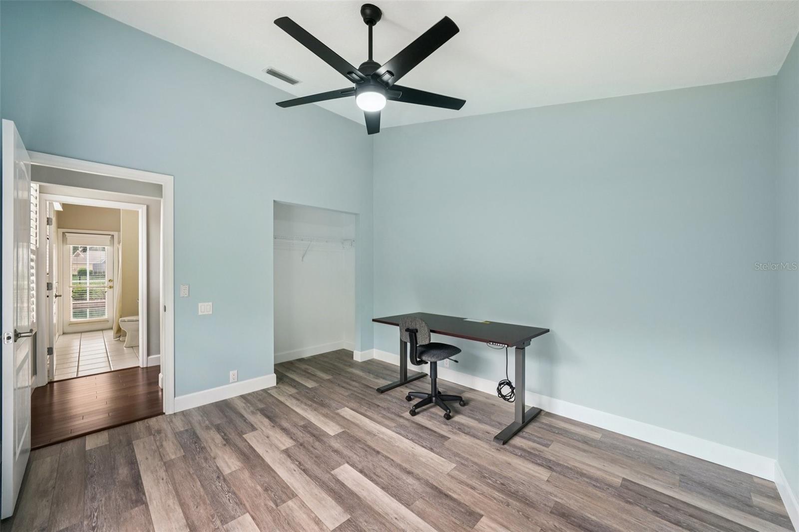 The guest suite is tucked away for added privacy and convenient to the full pool bathroom with direct access to the pool.