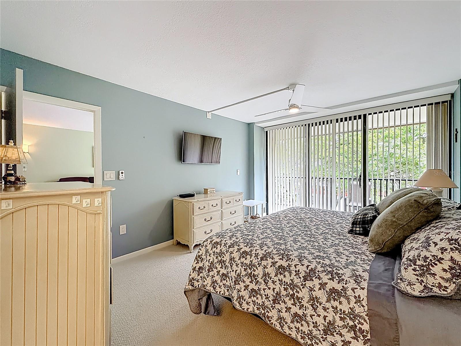 2700 Bayshore 9302, primary bedroom, sliders to balcony