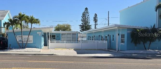 Pool is located behind fence