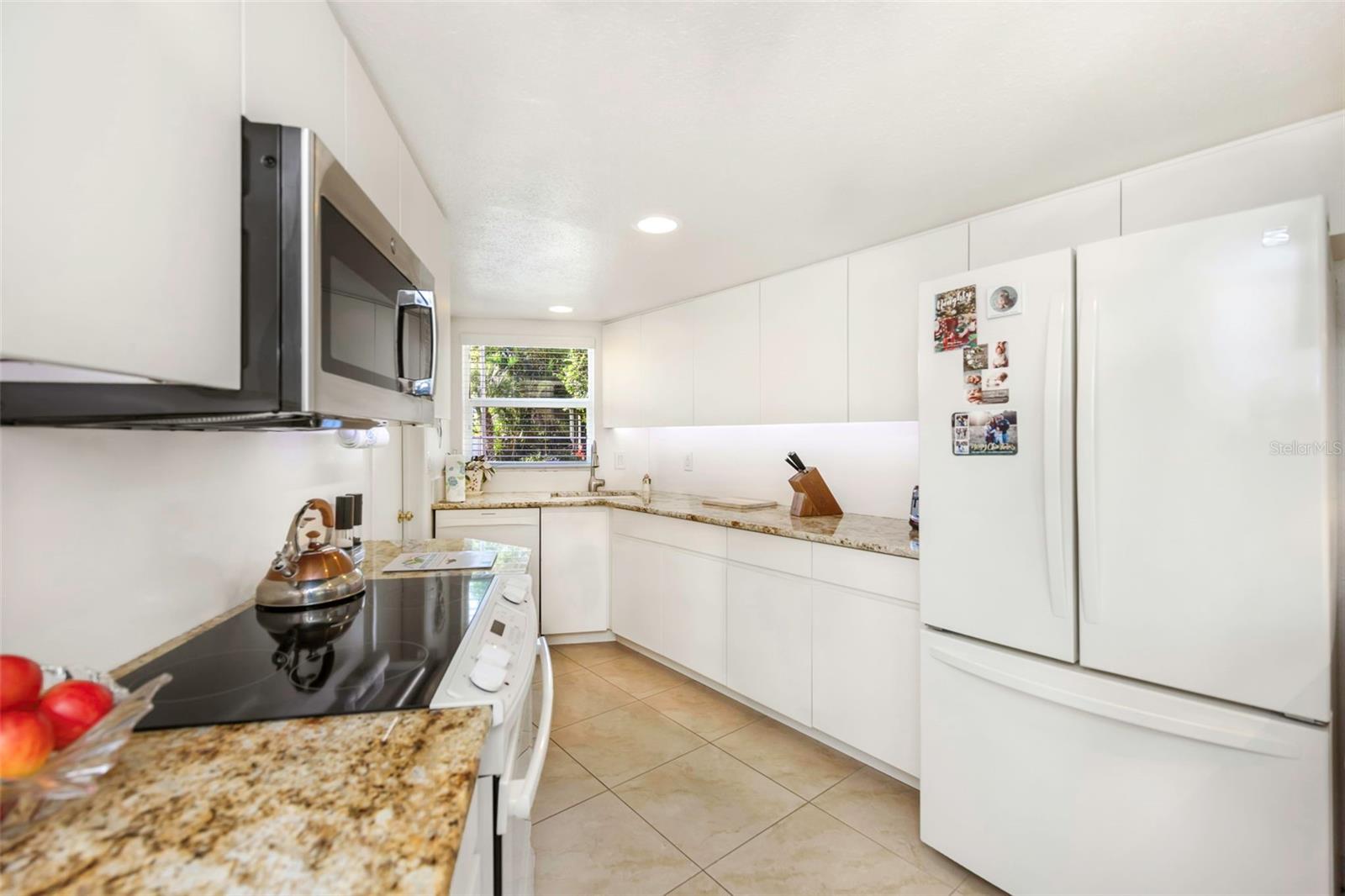 spacious kitchen with generous cabinet and counter space