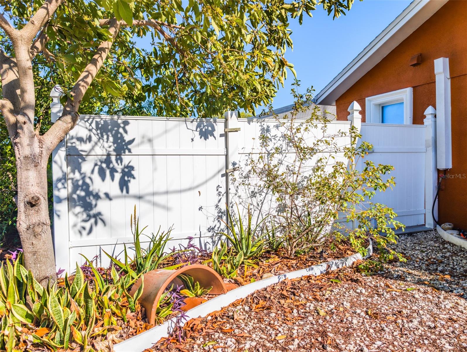 White pvc fenced in yard