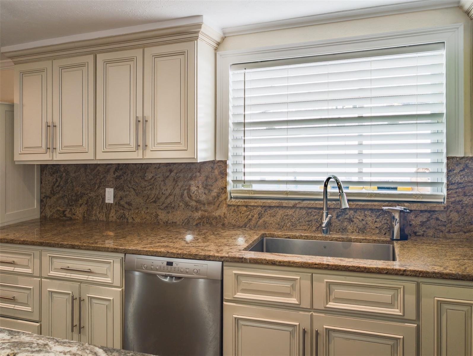 keep an eye on the activities outside while working in the kitchen