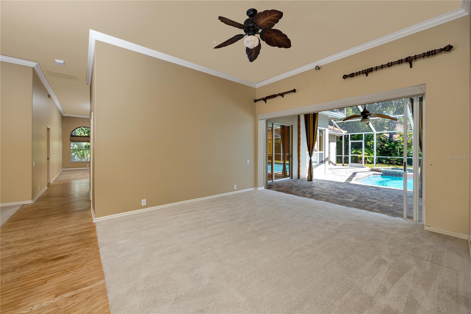 Formal Living Room with sliders that pocket for pool and patio access, · 1471 Briargrove Way Oldsmar FL 34677