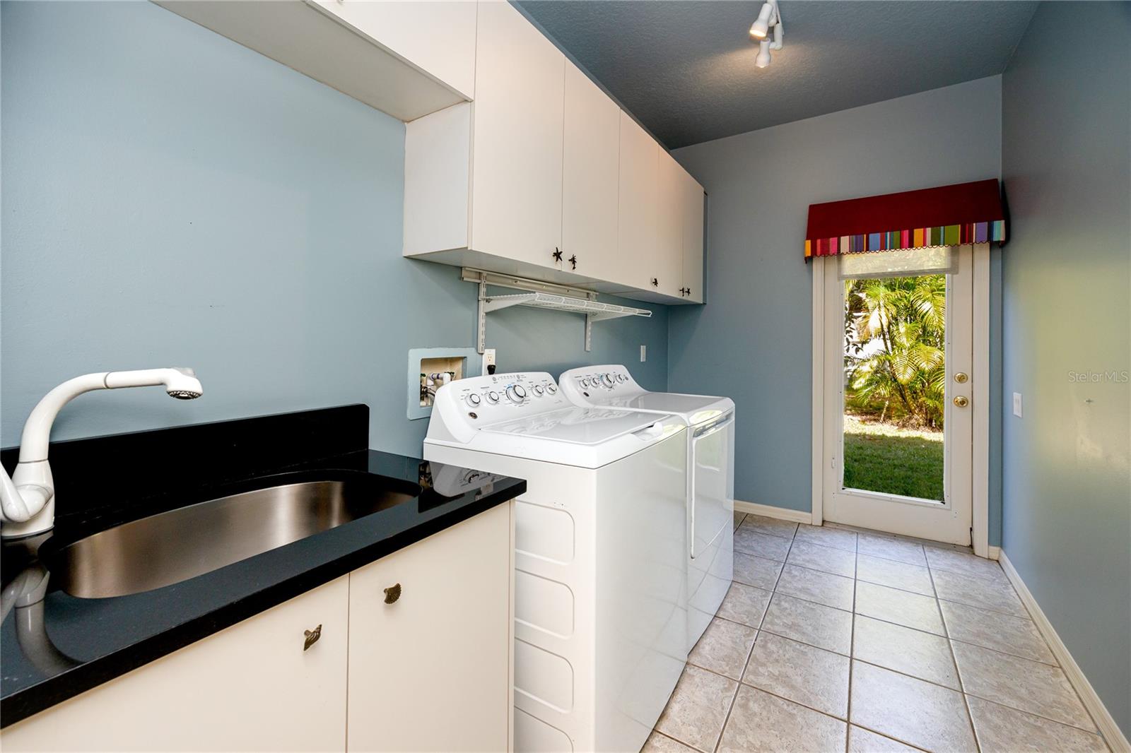 Spacious inside laundry room · 1471 Briargrove Way Oldsmar 34677