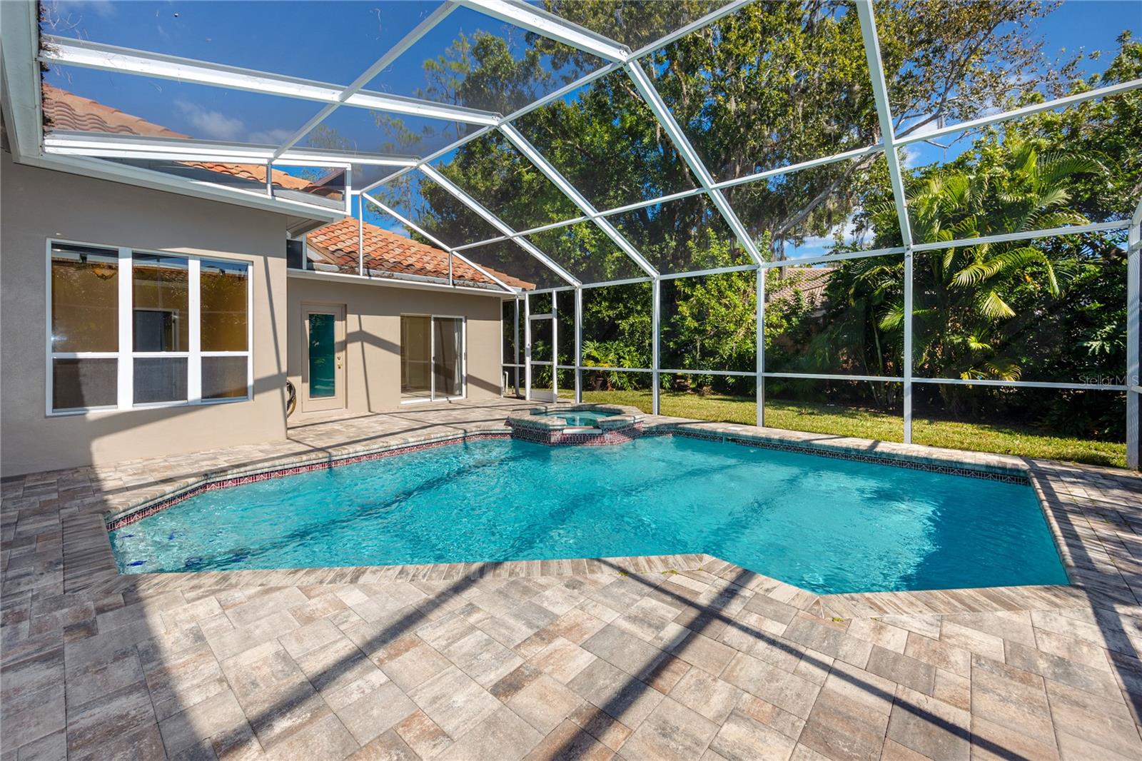 Premium paver lanai, screened pool enclosure · 1471 Briargrove Way Oldsmar FL 34677
