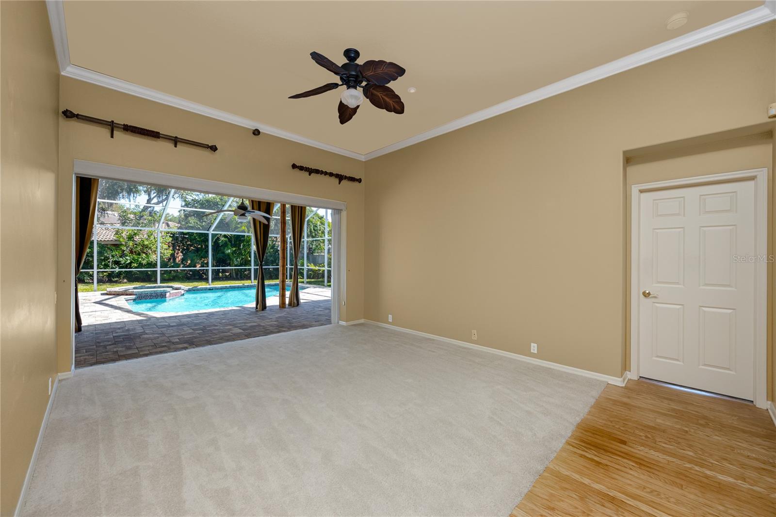 Formal Living Room with sliders that pocket for pool and patio access, · 1471 Briargrove Way Oldsmar FL 34677