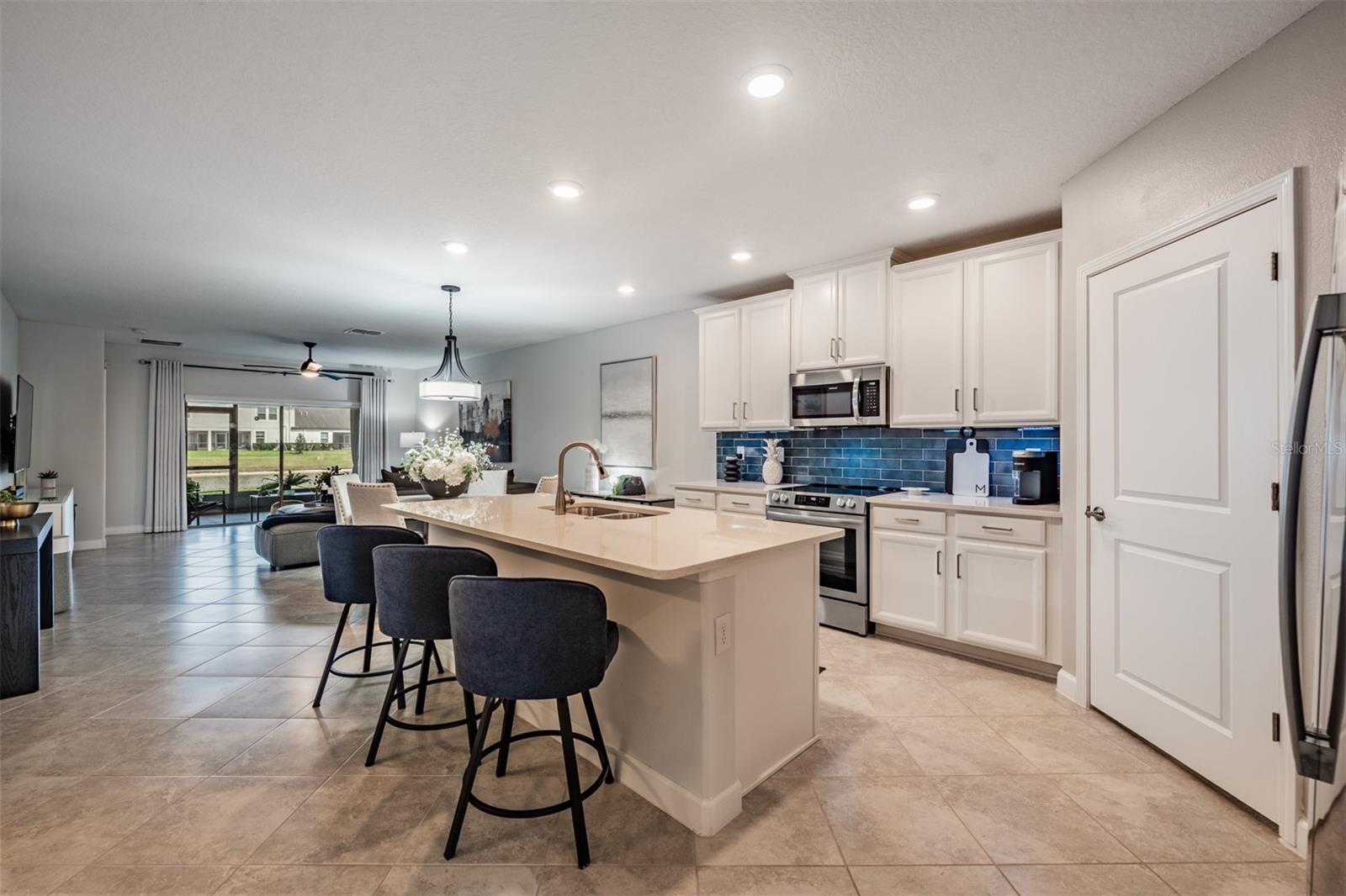 OPEN kitchen with stunning glass backsplash
