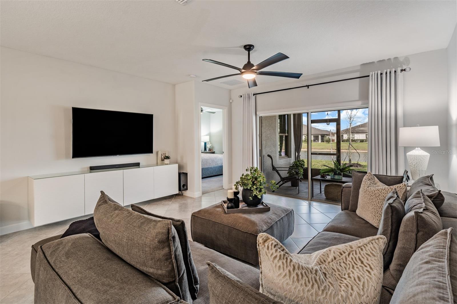 Built in custom storage under mounted TV adds class and function