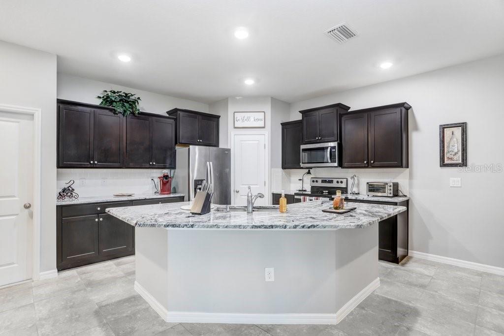 Spacious Kitchen with walk in pantry.  All appliances are included