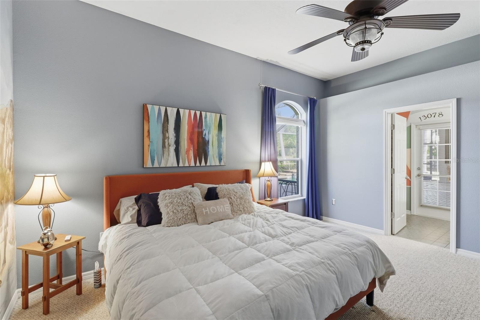 Versatile guest bedroom with walk-in closet and easy access to the pool bath