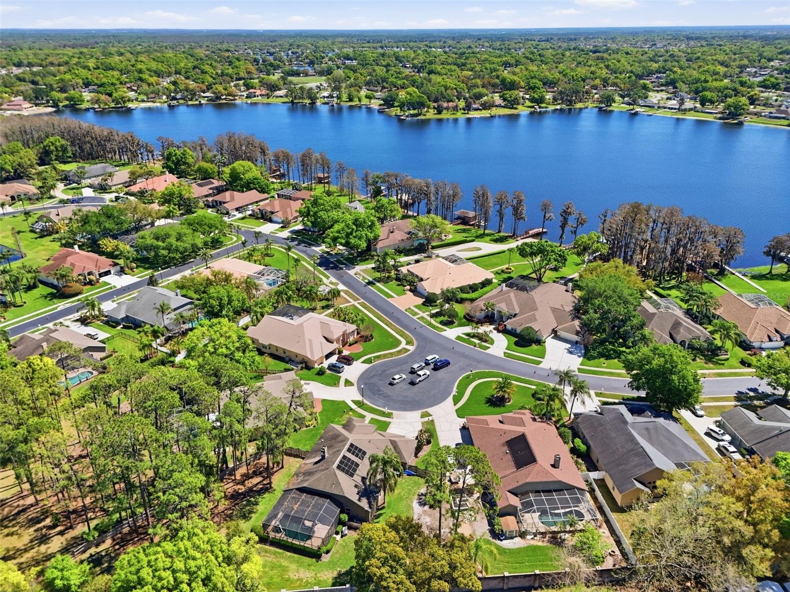 Aerial view highlighting the home’s close proximity to Lake Padgett with convenient boat ramp access