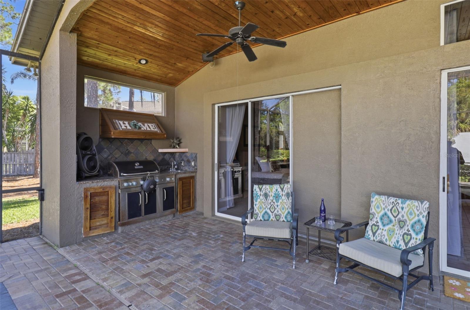 Covered outdoor space, perfect for entertaining by the pool