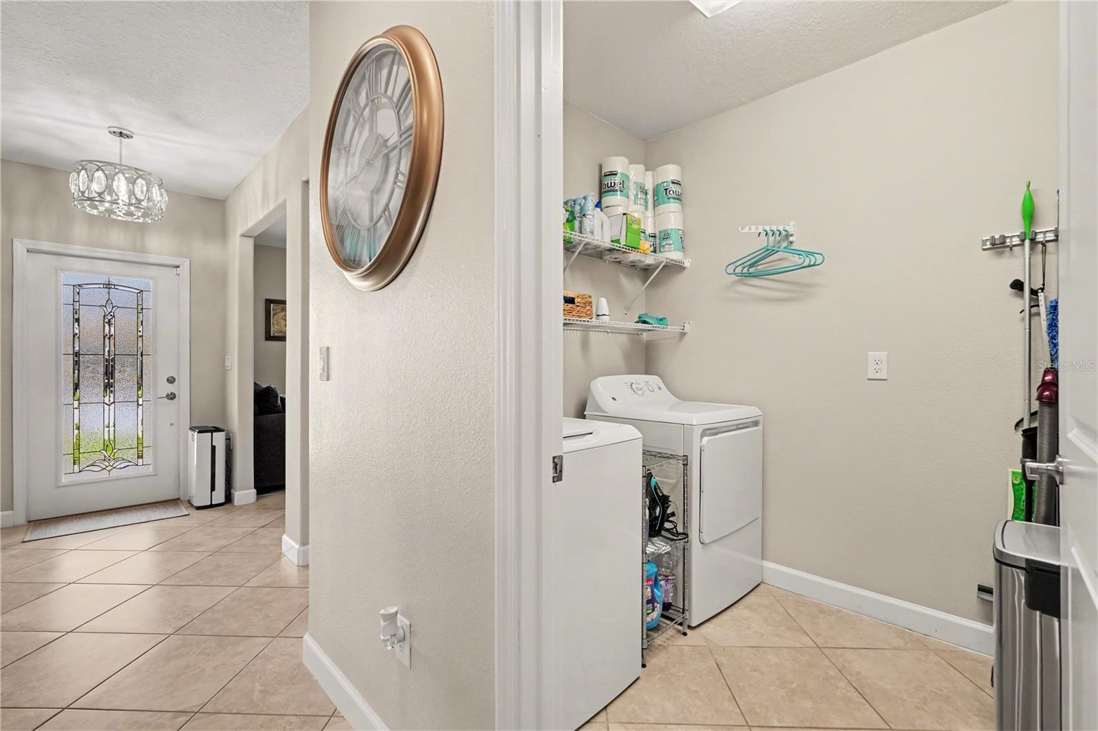 Interior laundry room with washer/dryer & room for extra storage