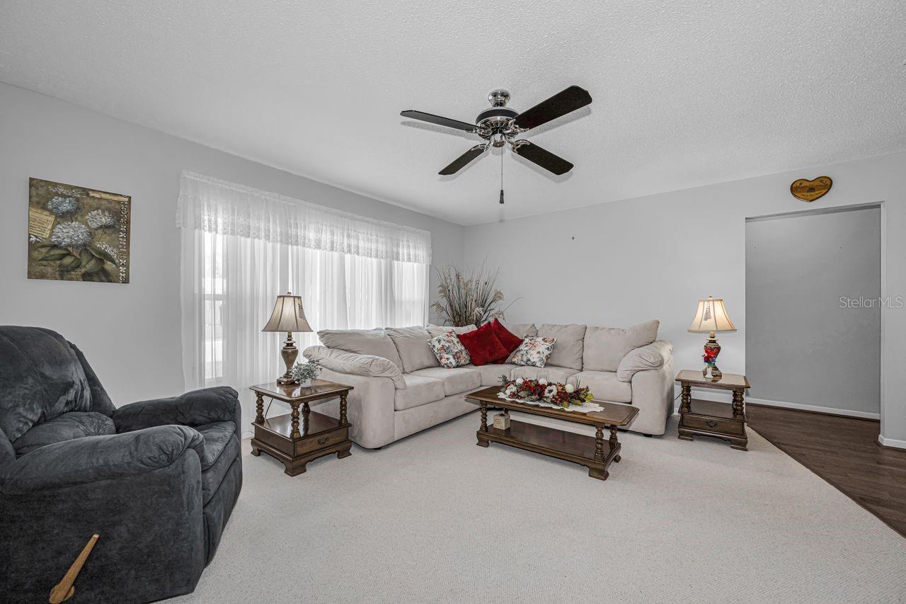 Sunshine abounds in this meticulously maintained home.