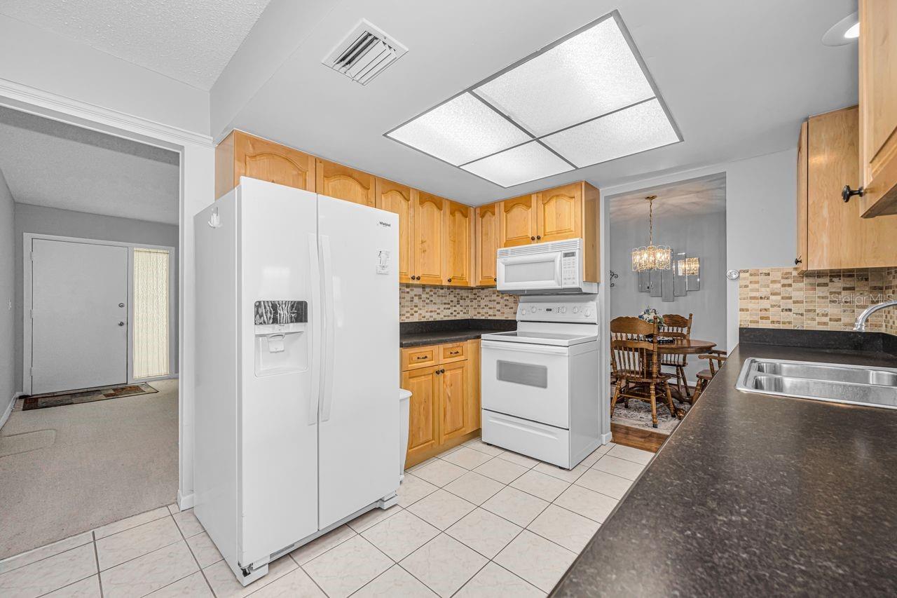 Spacious, bright, and lovingly maintained kitchen.