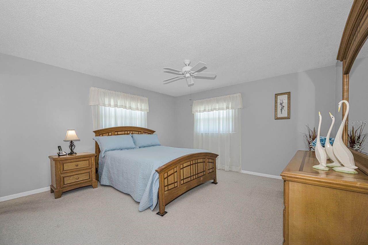 So much space and natural lighting in this primary bedroom
