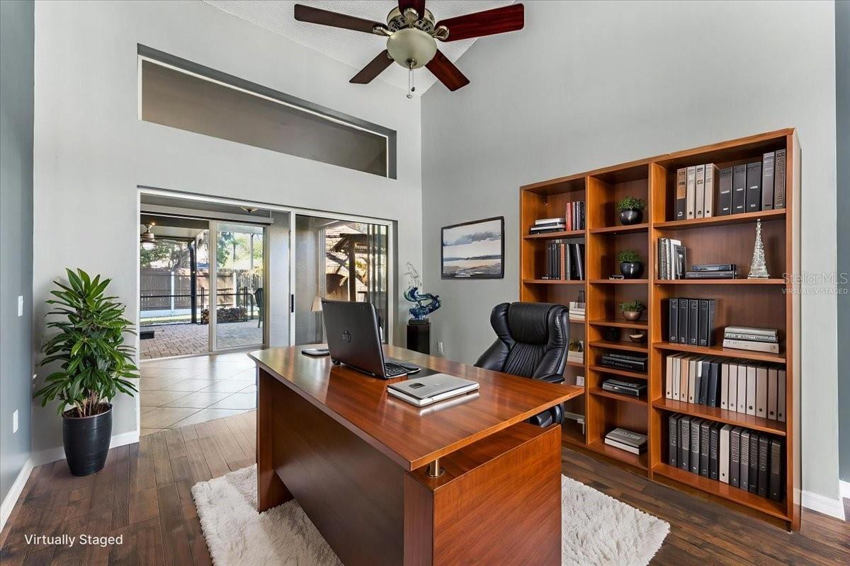 Dining area virtually staged as an office