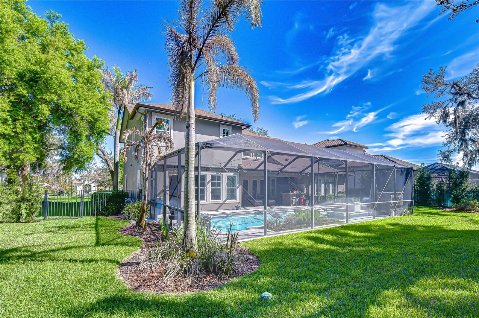 Covered Lanai and heated pool.