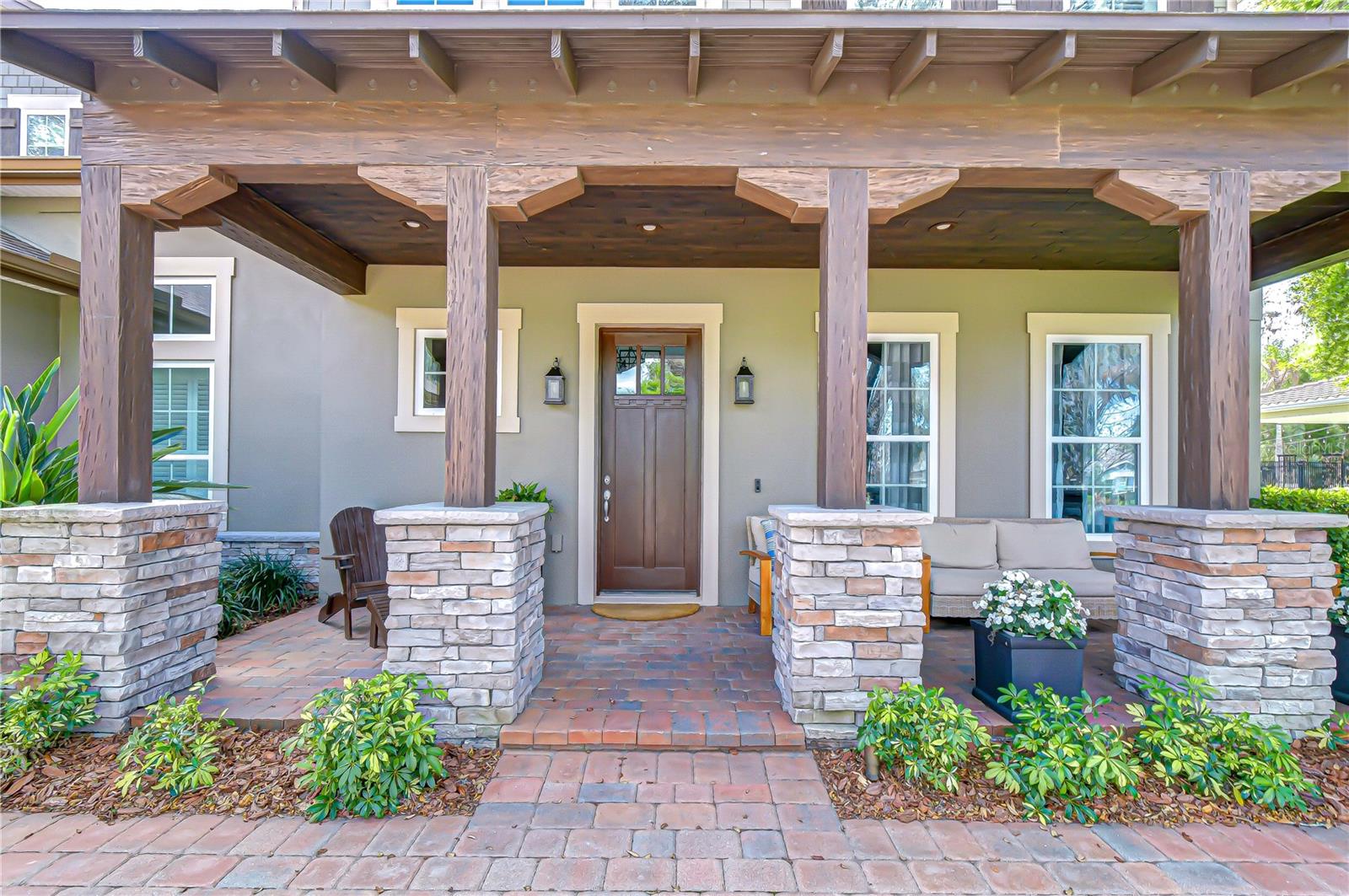 Expansive front porch offering peaceful views and a relaxing setting.