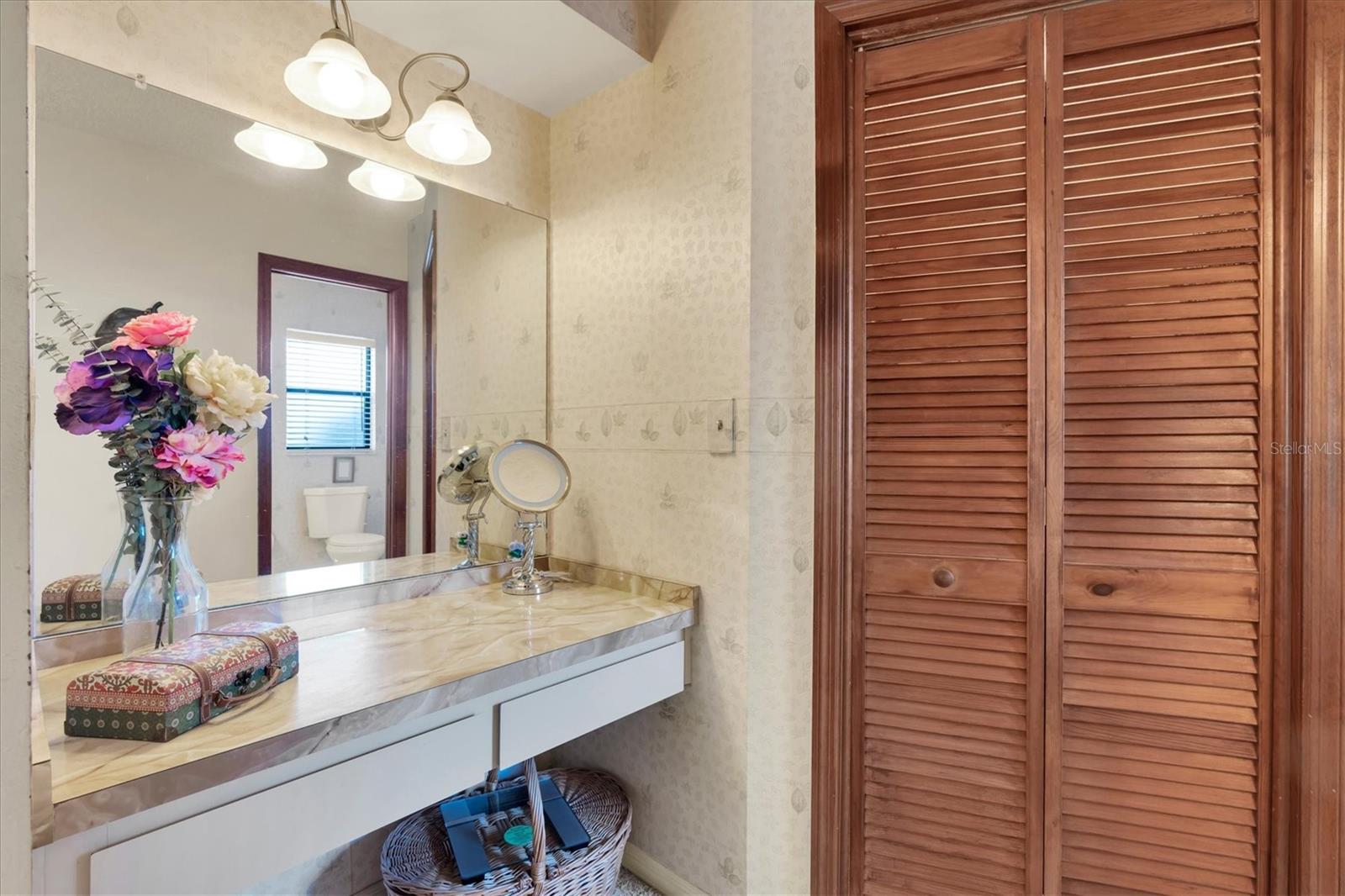 Primary Bedroom with Walk-in closet and dressing area