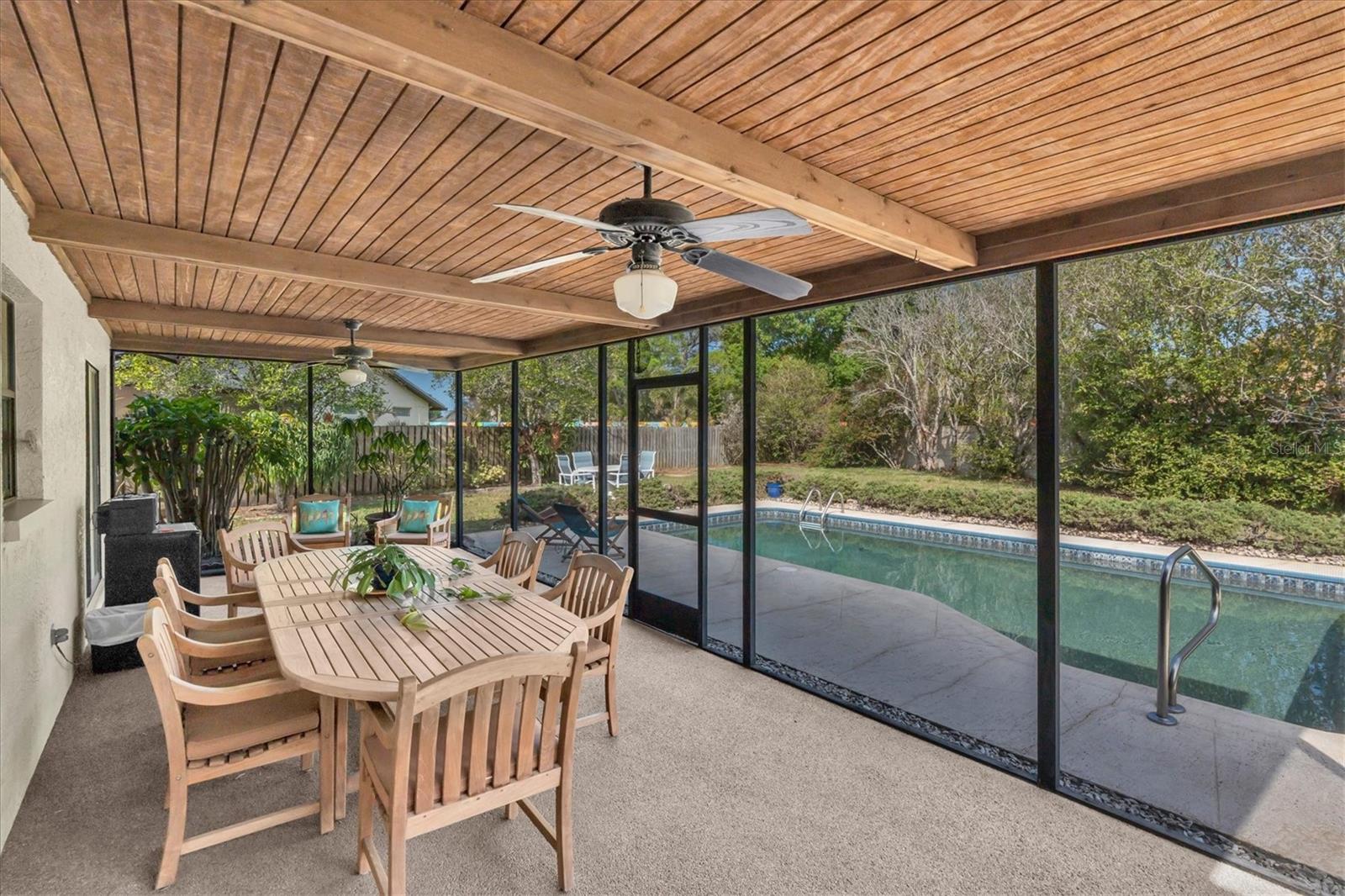 Large Screened Porch overlooking pool and huge backyard