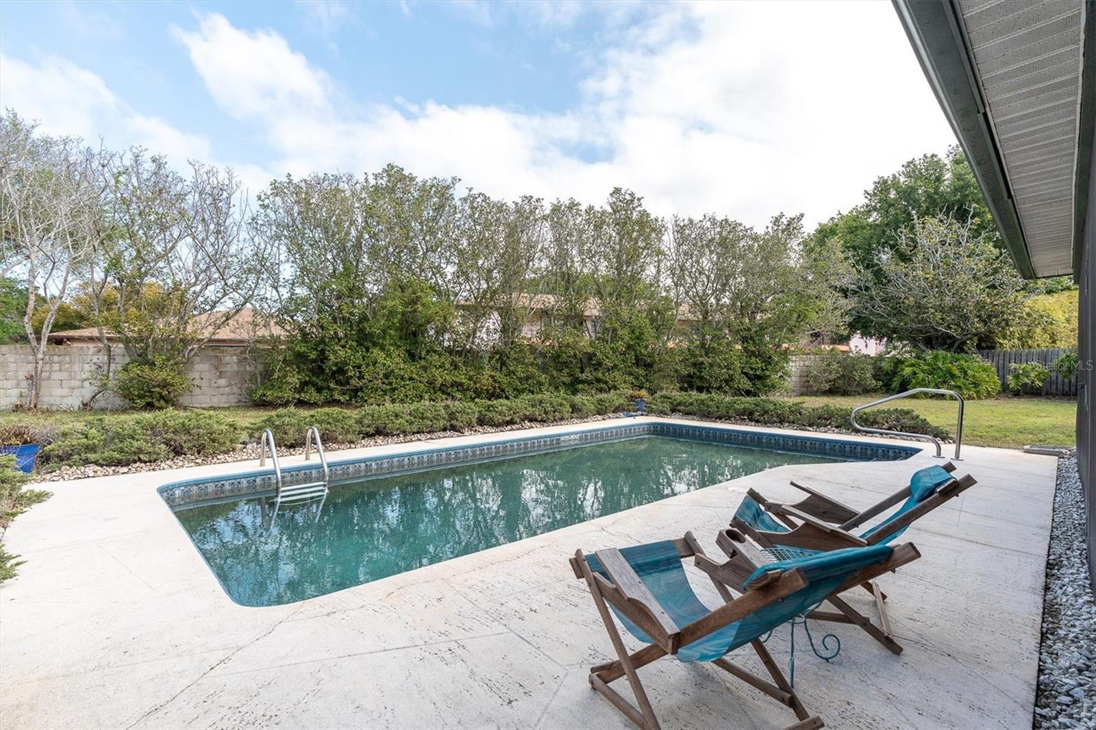 Inground pool and huge fenced backyard