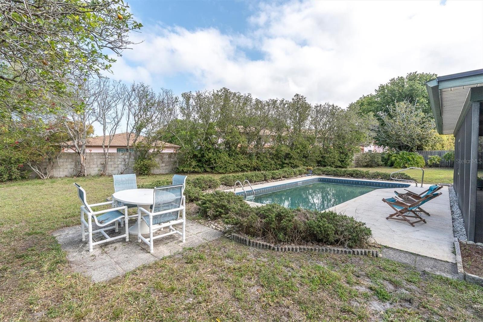 Inground pool and huge fenced backyard