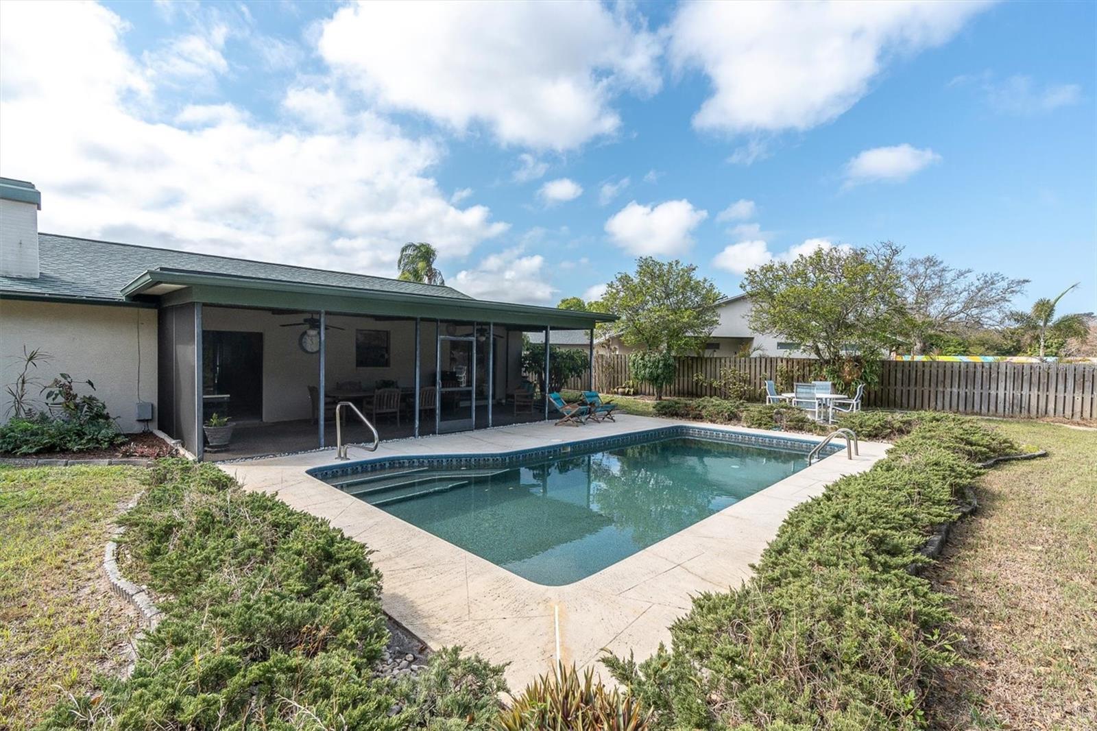 Inground pool and huge fenced backyard