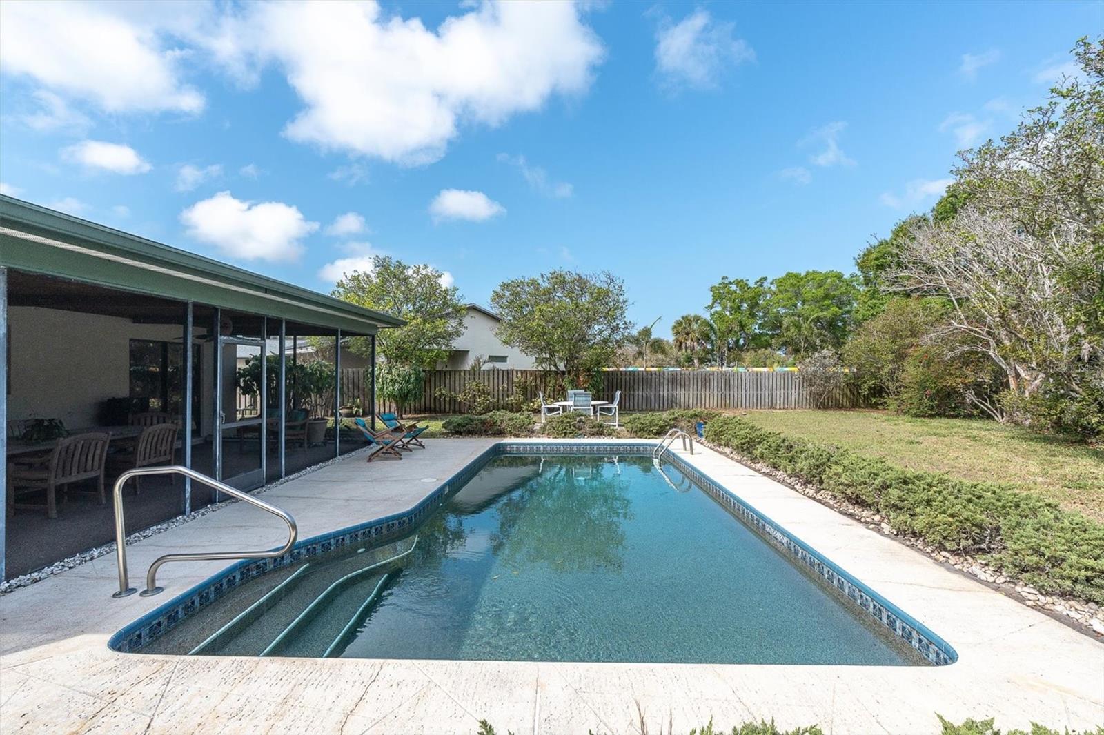 Inground pool and huge fenced backyard