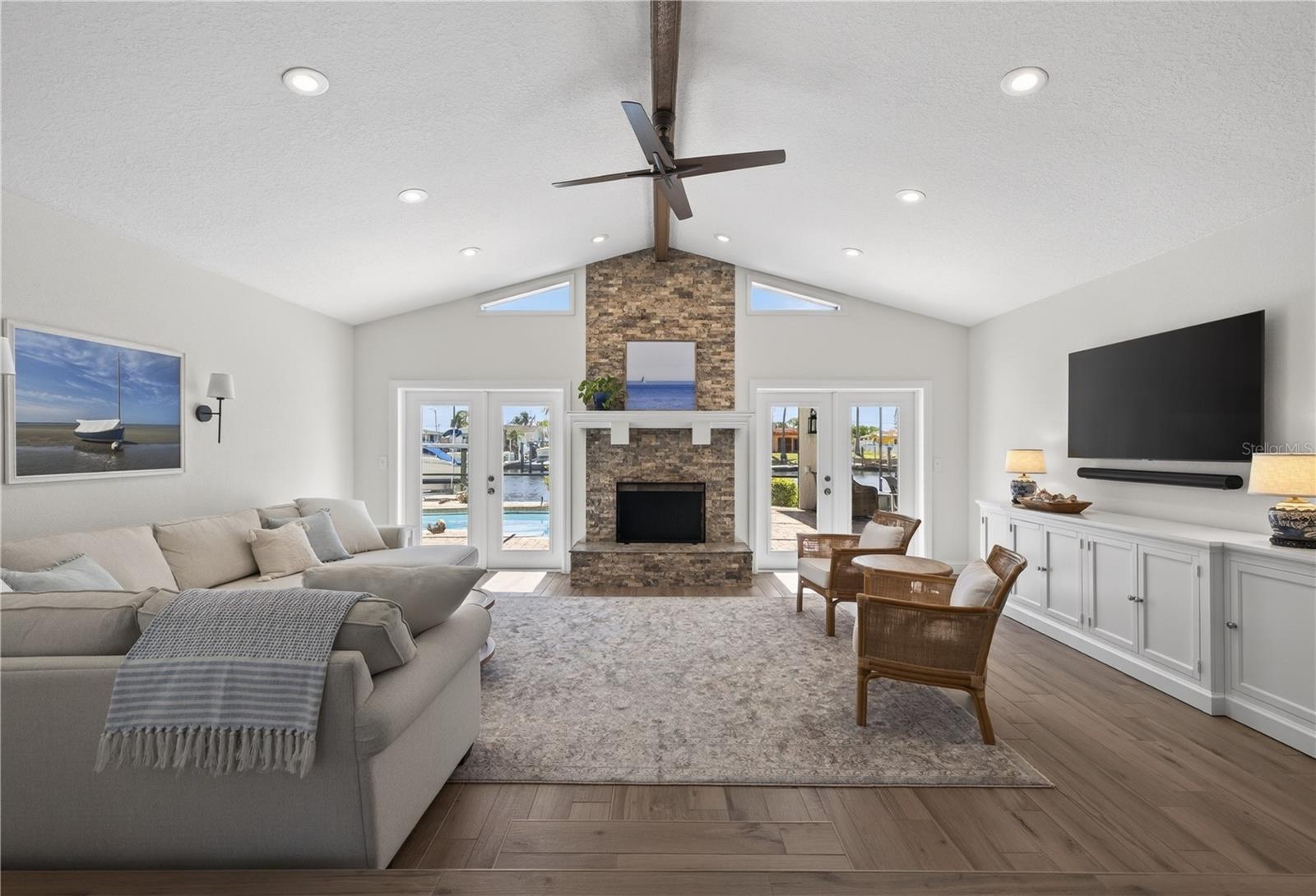 Great room with soaring ceilings and fireplace