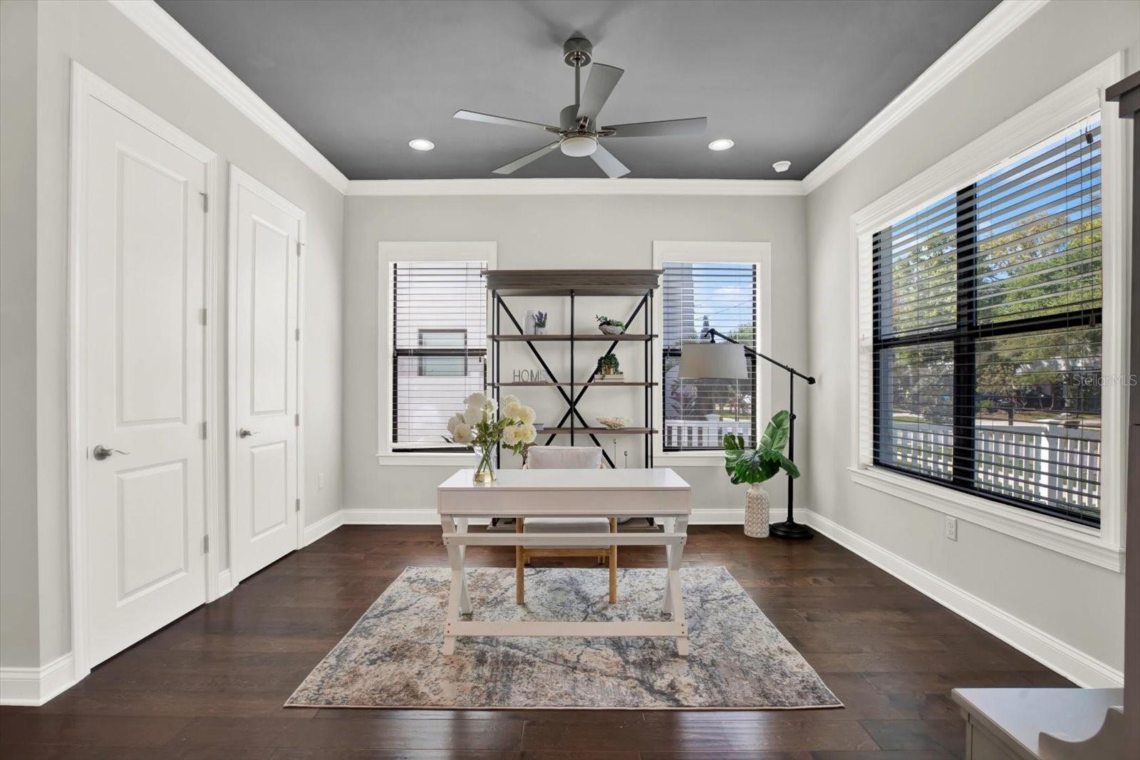 Bedroom 1 is staged as an office.