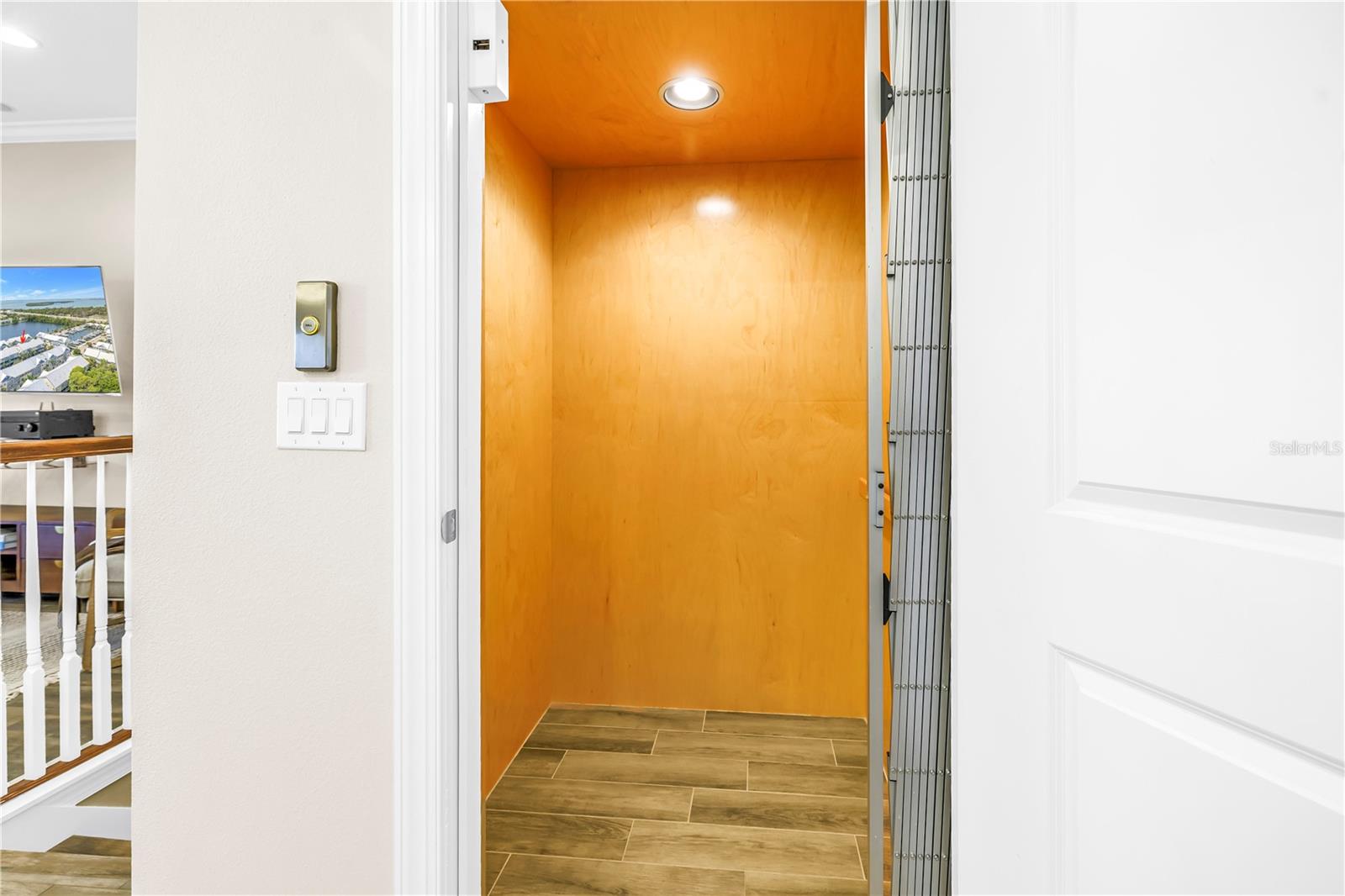 Private elevator servicing all three floors