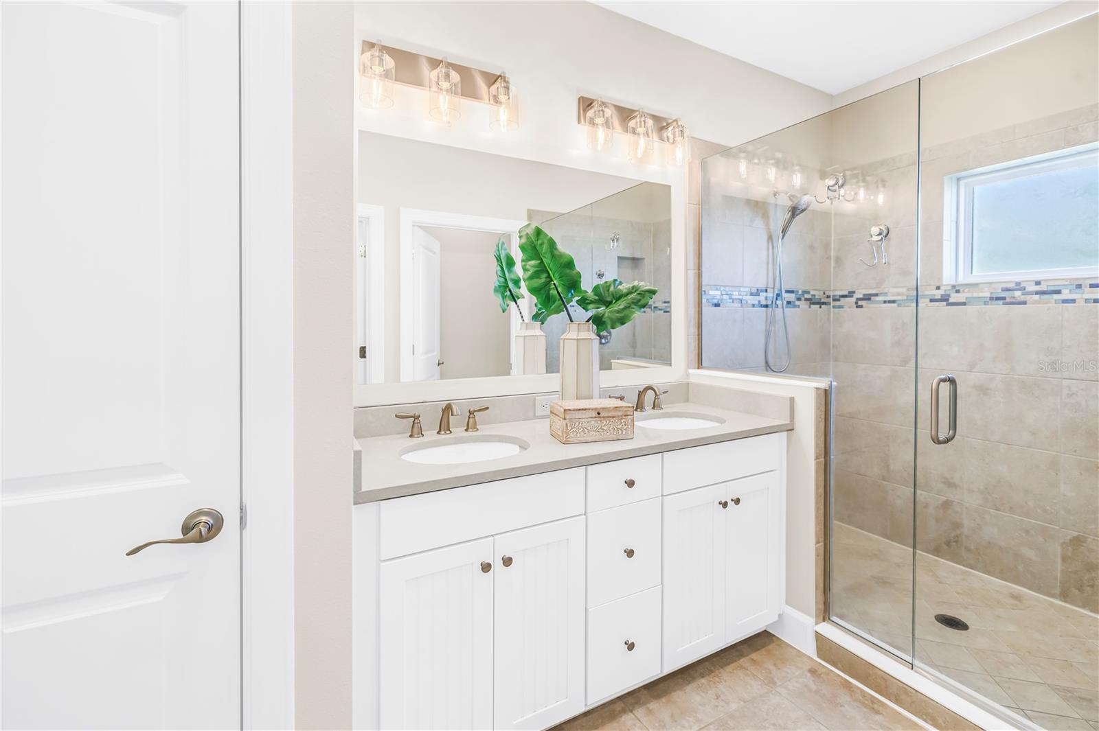 Primary Bath with seamless shower and dual vnity