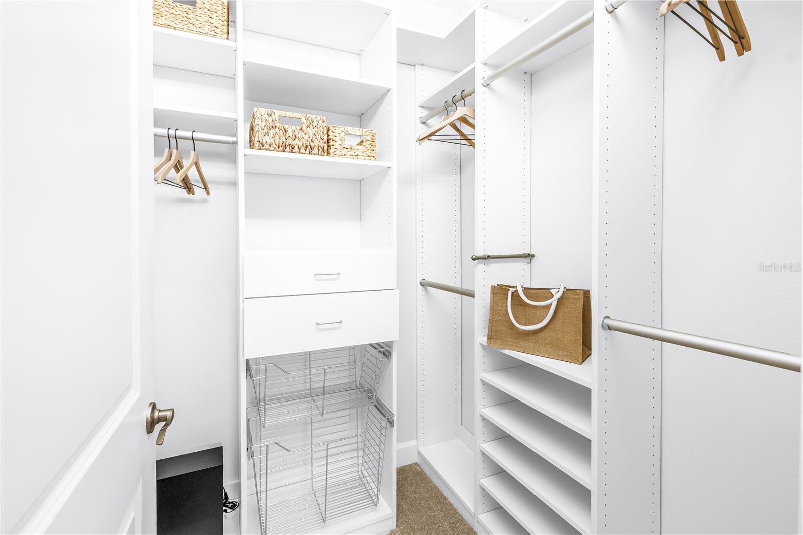 Walk-in Closet with custom built-ins - Primary Bath