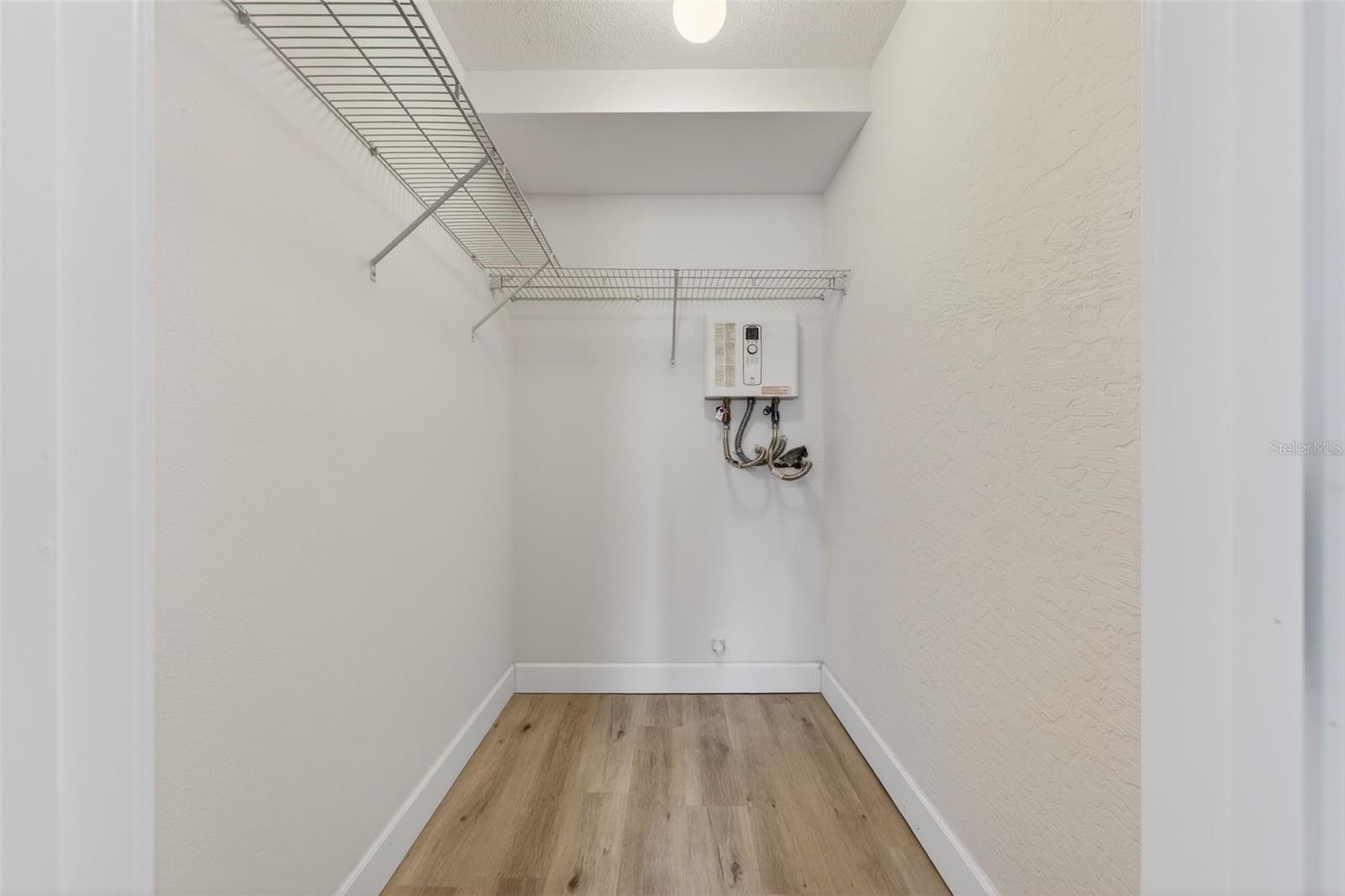 Walk-in closet in bedroom