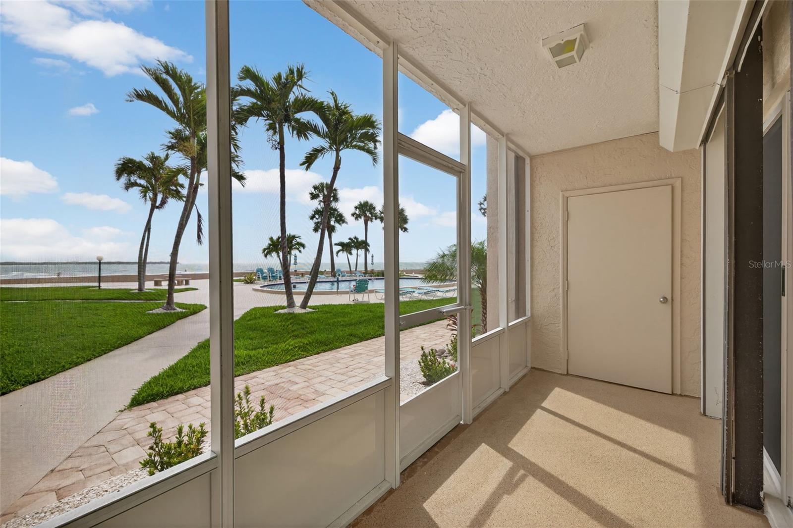 Screened patio with additional storage closet