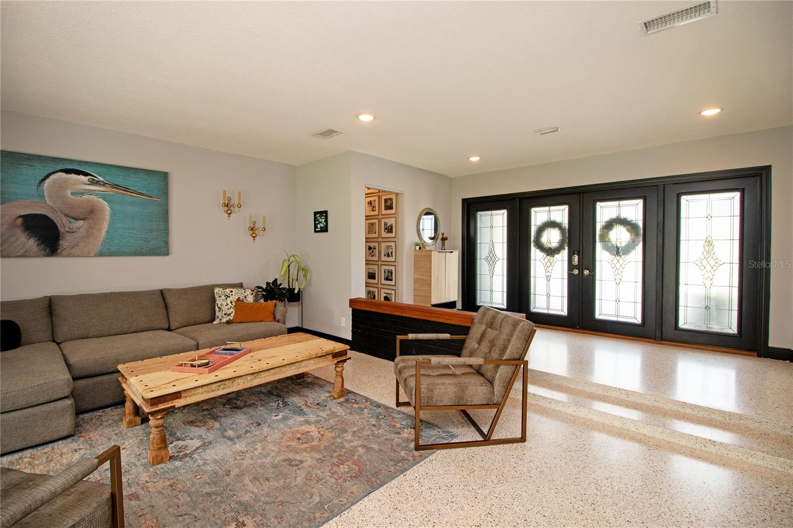 The front doors allow in natural light.