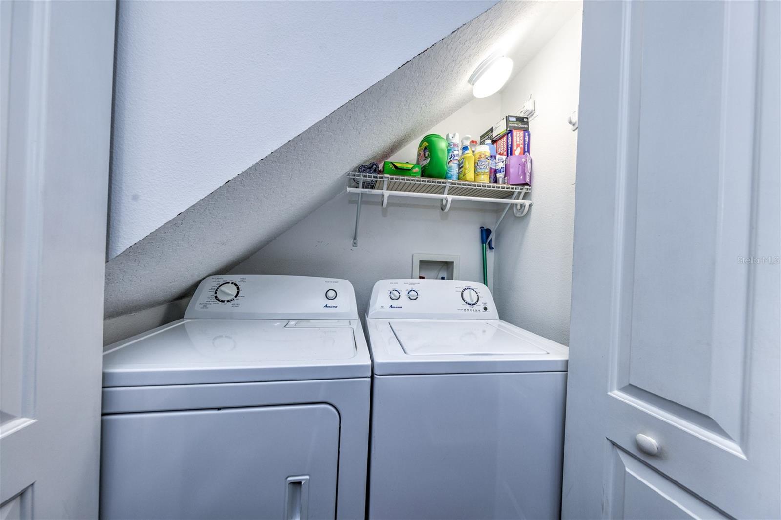 laundry under stairs