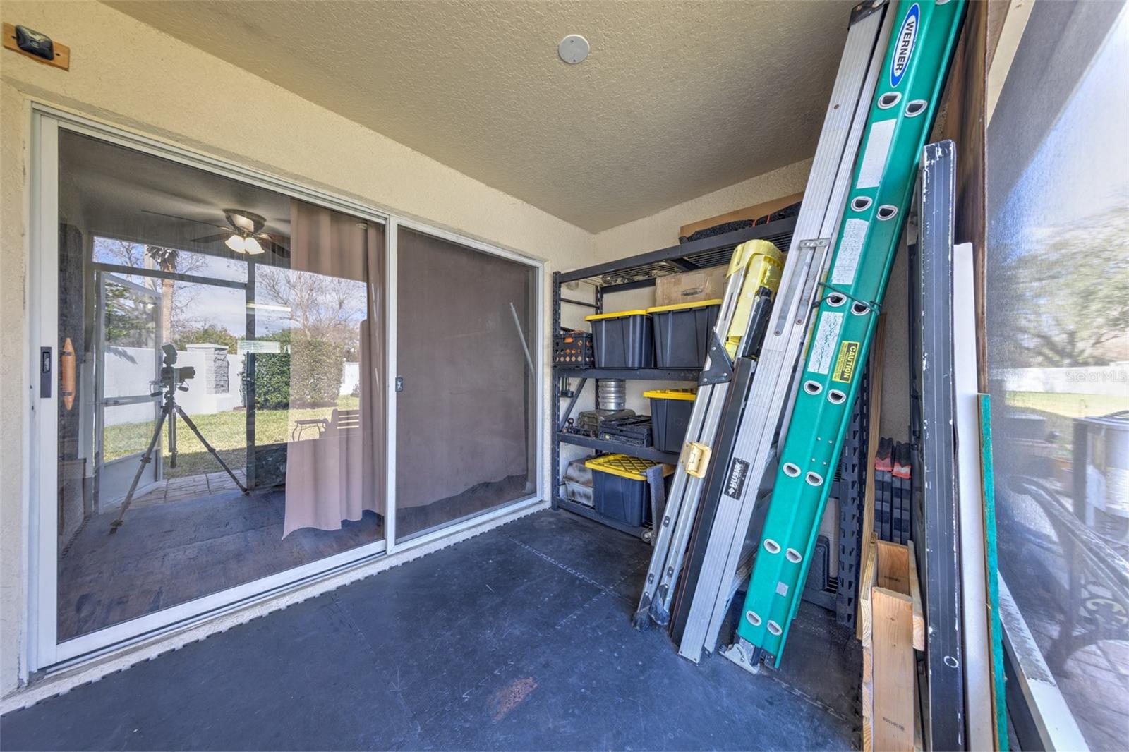 plenty of space for storage, outdoor dining, wicker couch for lounging