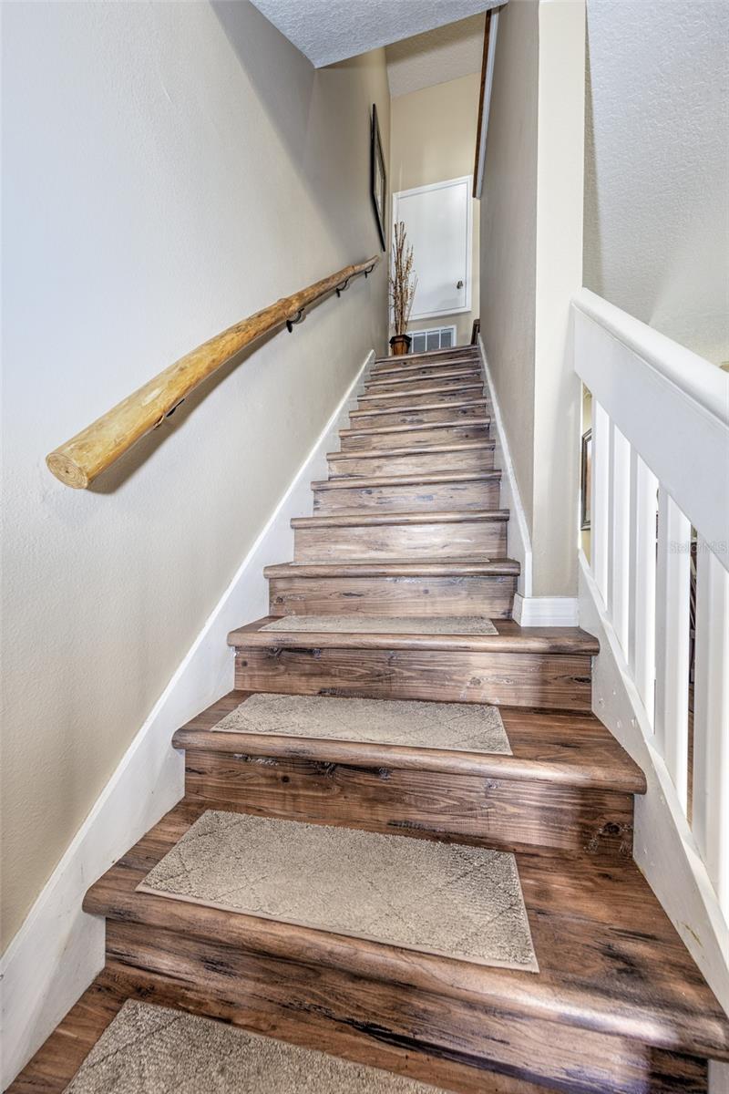 custom hand carved wood handrail