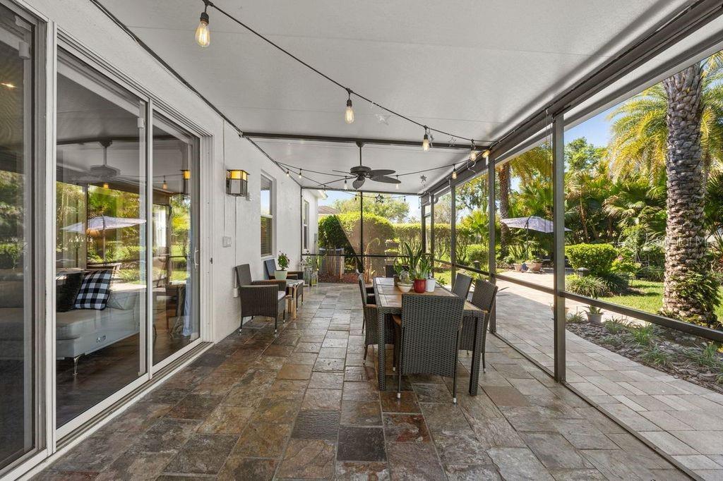 Large screened-in lanai perfect for relaxing and entertaining
