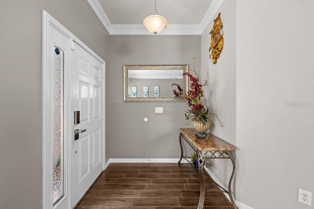 Bright and inviting entryway with modern finishes