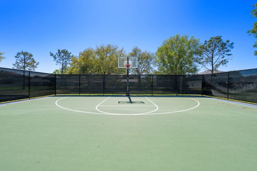 Community amenities including courts, playground, and green spaces