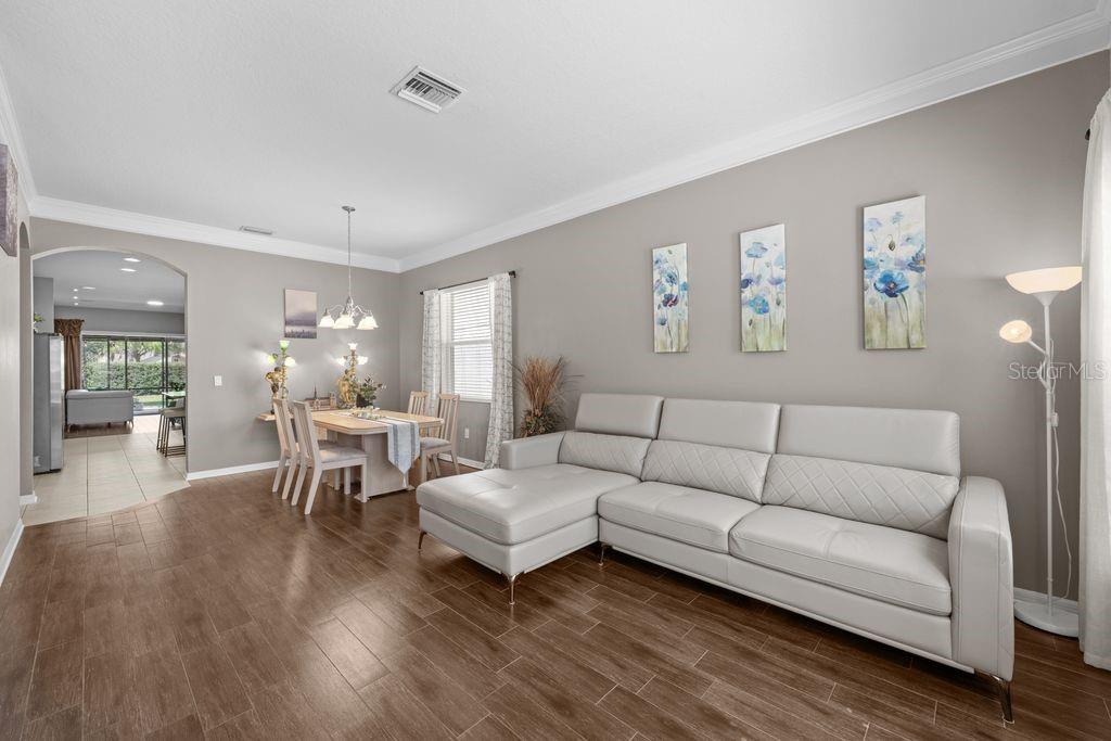 Spacious living room with abundant natural light and open layout