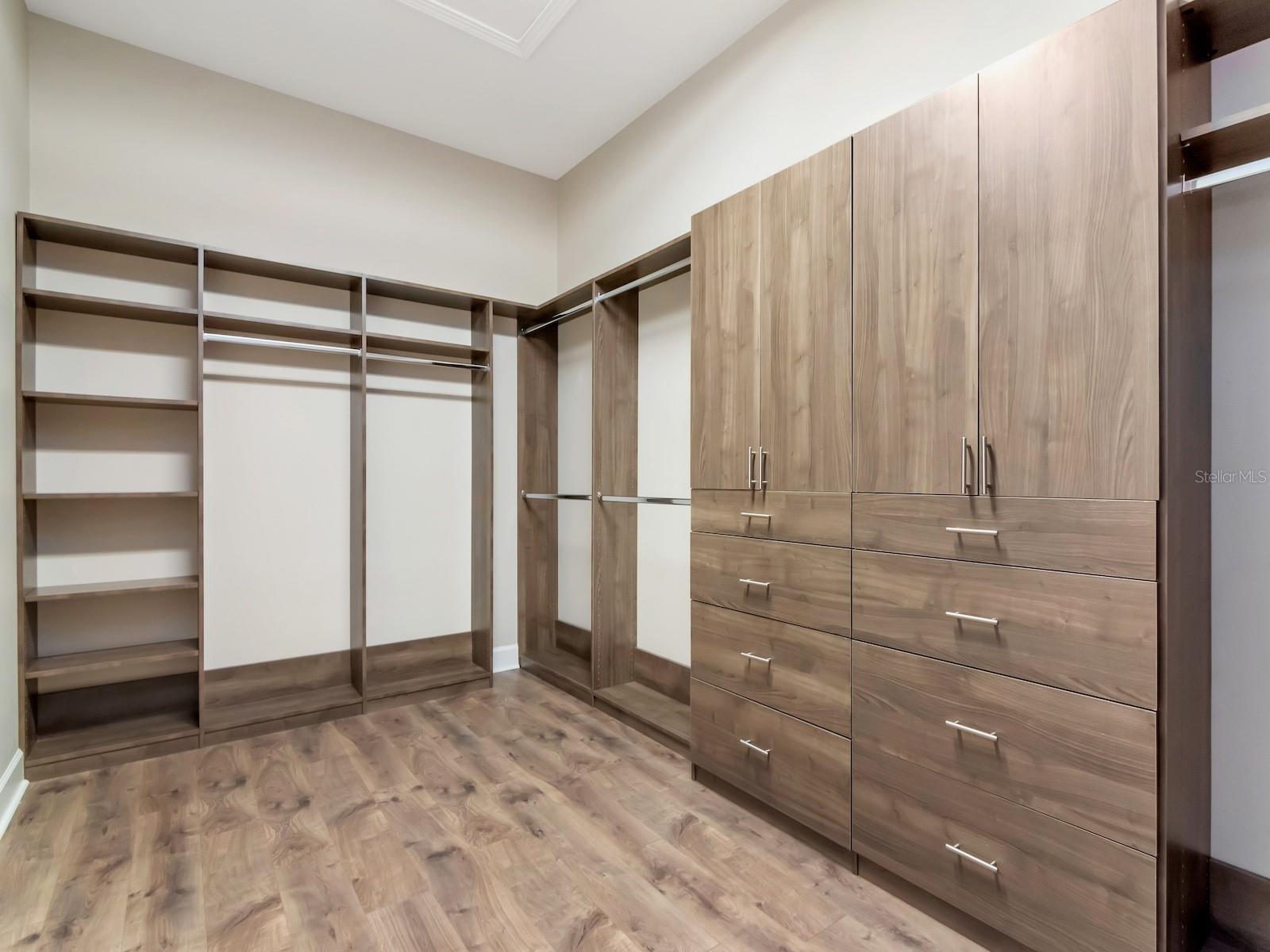 Primary closet with custom closets