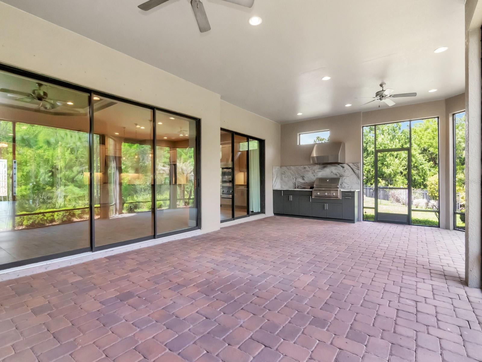 Oversized patio with outdoor kitchen