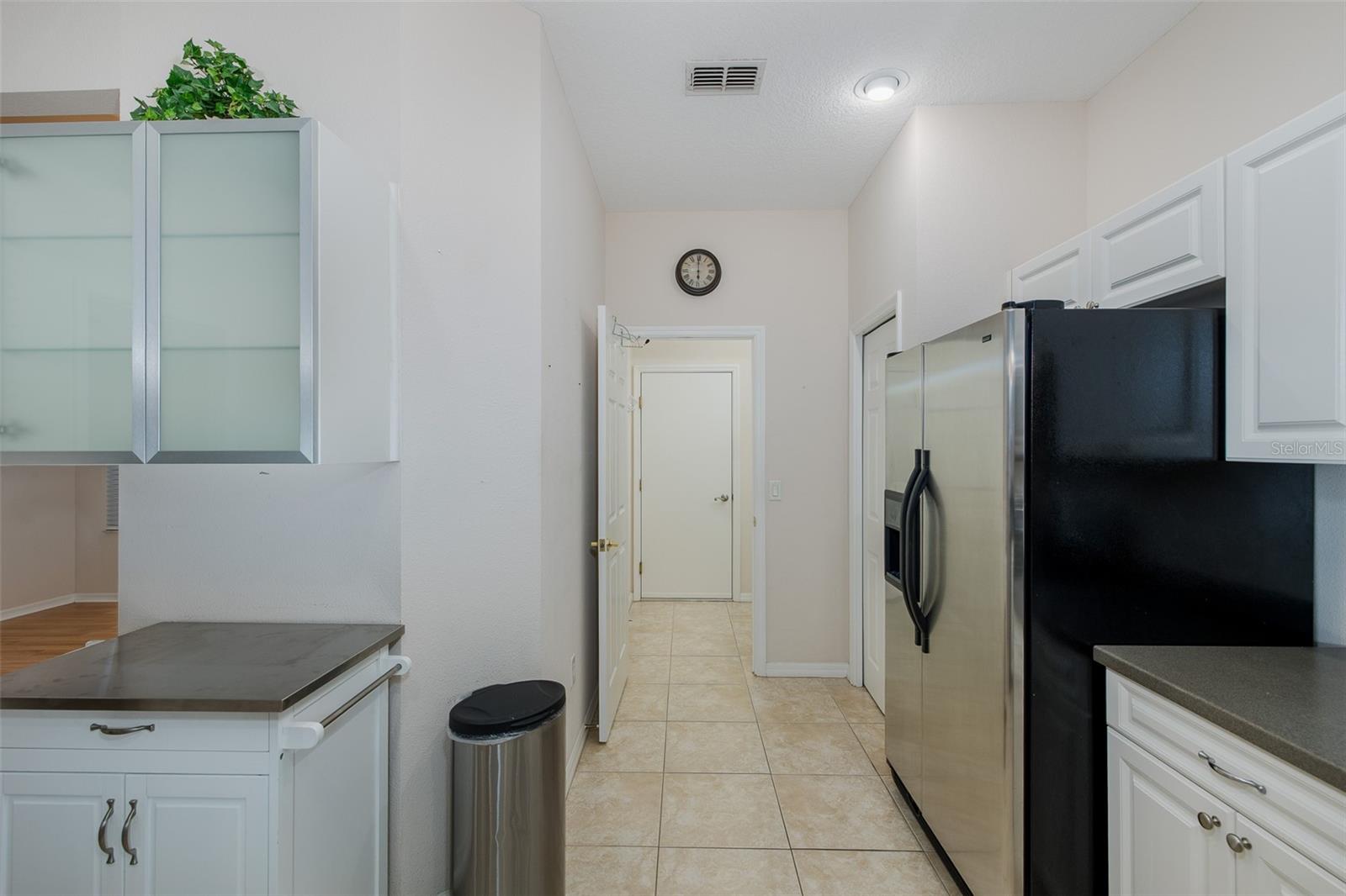 Kitchen leading into the laundry room