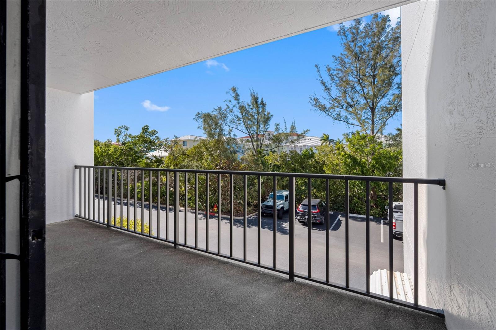 ... View from Kitchen out to West Side Balcony. This 18.3 X 6.3 Balcony can be accessed from Kitchen & Guest Bedroom. Balc Shot #2..